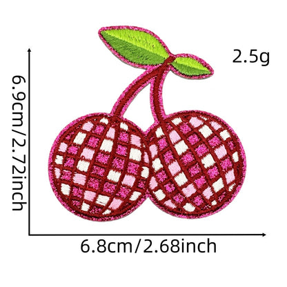 fruit and butterfly-shaped iron-on patches with a disco-ball pattern
