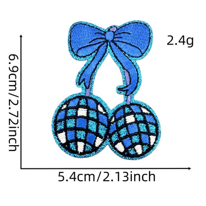 fruit and butterfly-shaped iron-on patches with a disco-ball pattern